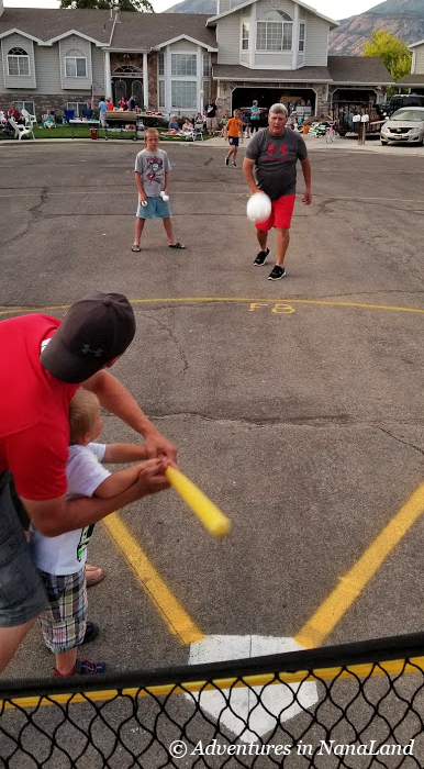 Kids playing Wiffle ball with grandparents - Grandma Camp Weekend - Adventures in NanaLand