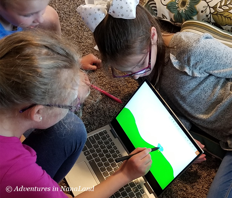 Kids using a painting program on a laptop - Fun Things to Do with Grandkids - Adventures in NanaLand