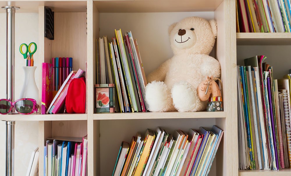 Childs bookshelf with books and teddy bear - Adventures in NanaLand