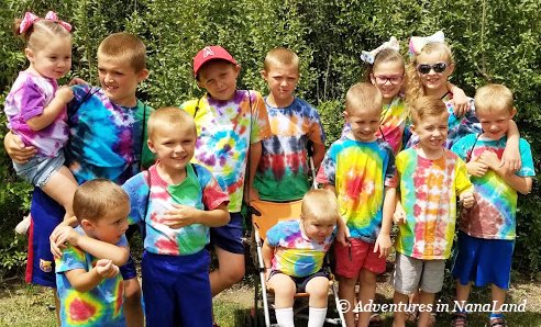 Group of kids in tie dye shirts - Grandma Camp Tips - Adventures in NanaLand